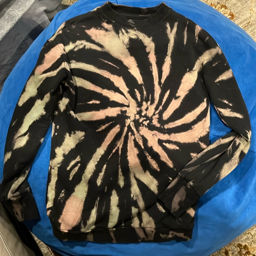 Women’s long sleeved pull over. Distressed tie-dye-ish style.
